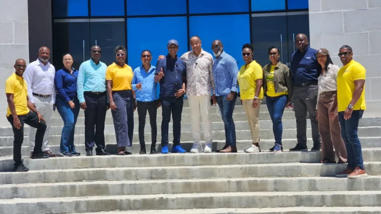 Mr Lee-Chin touring the Morant Bay Urban Centre